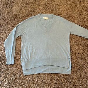 Blue V-neck sweater
